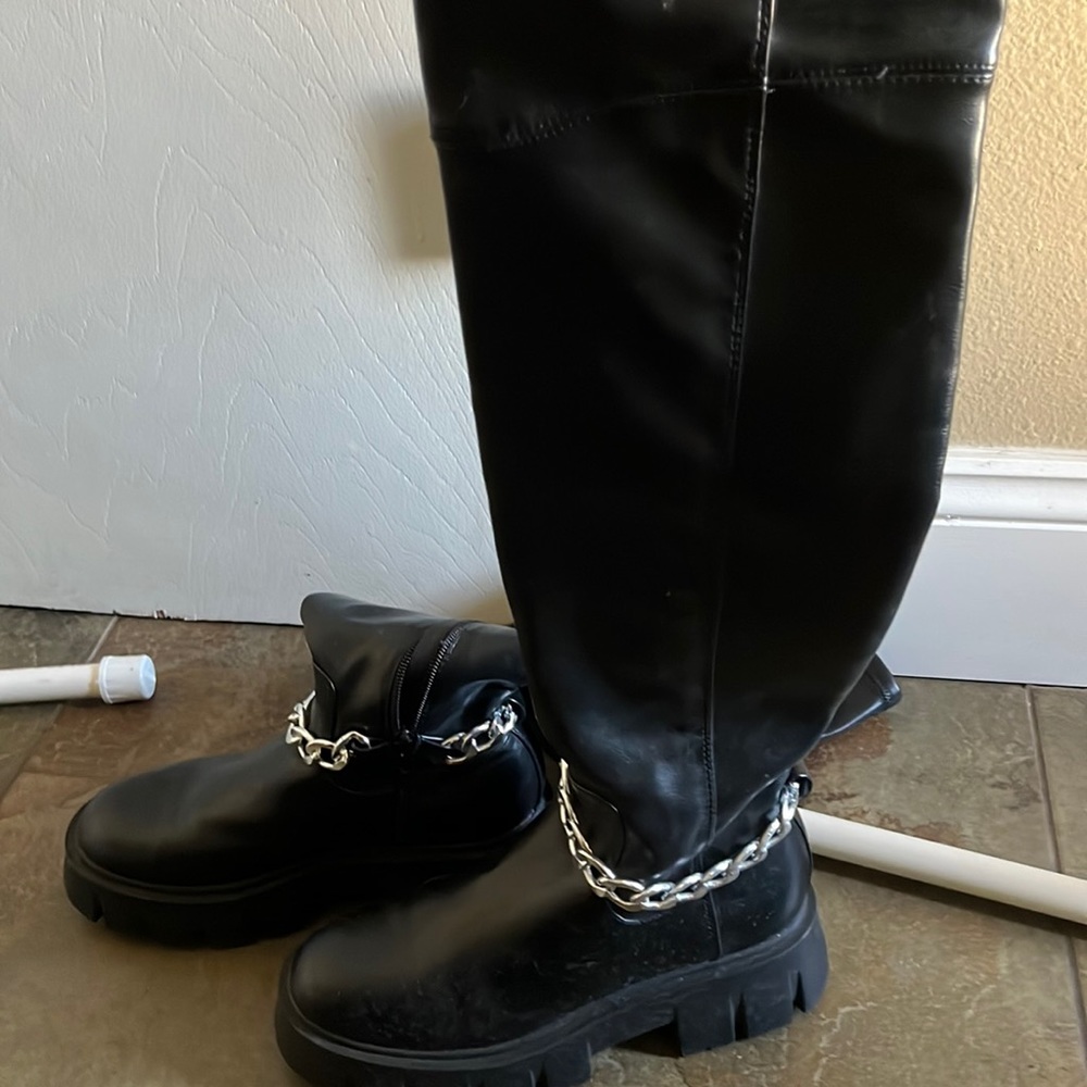 Black tall boots